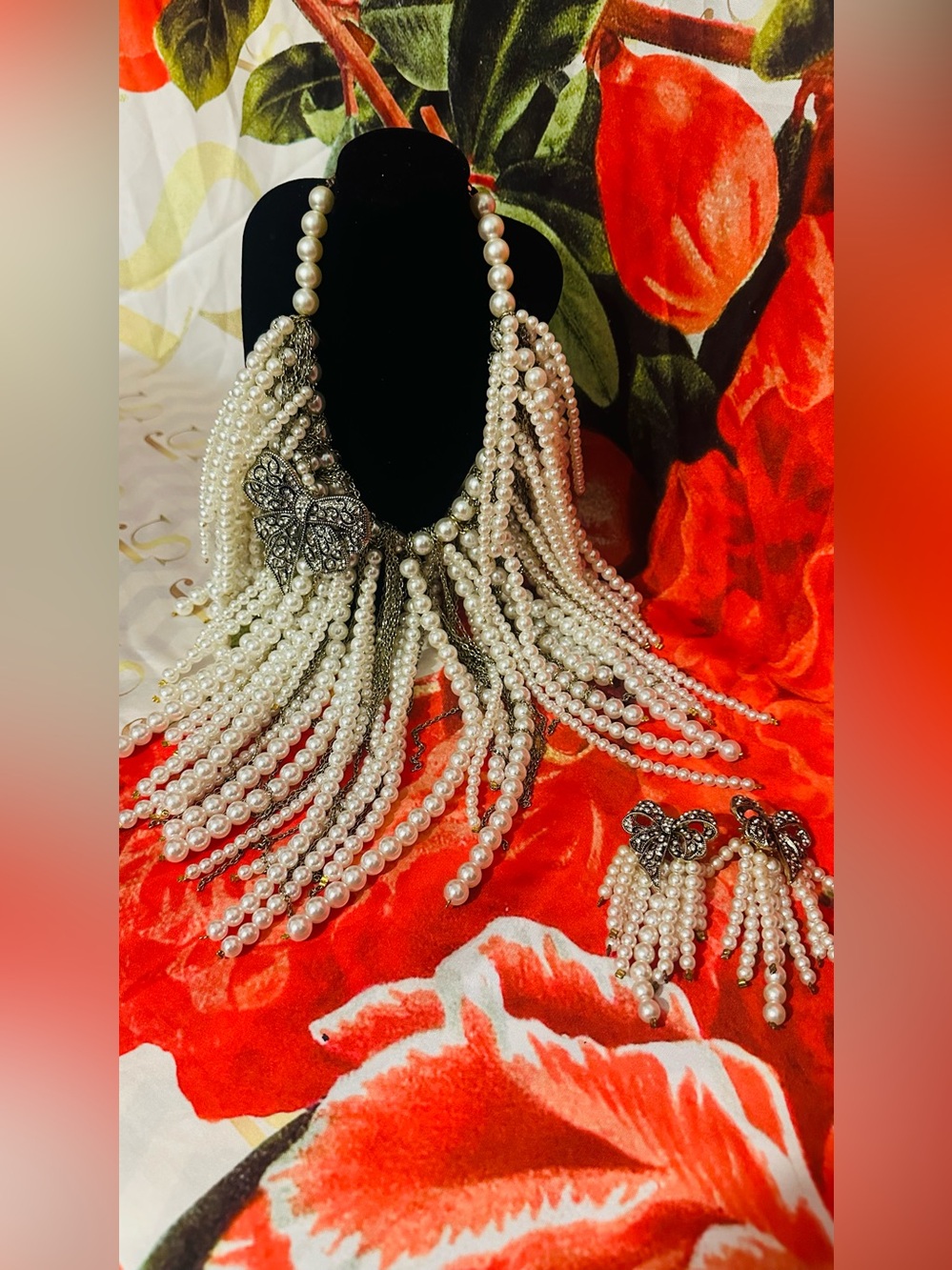 Sassy Jones Elegant Pearl Fringe Necklace and Earring Set - with Bow accent.